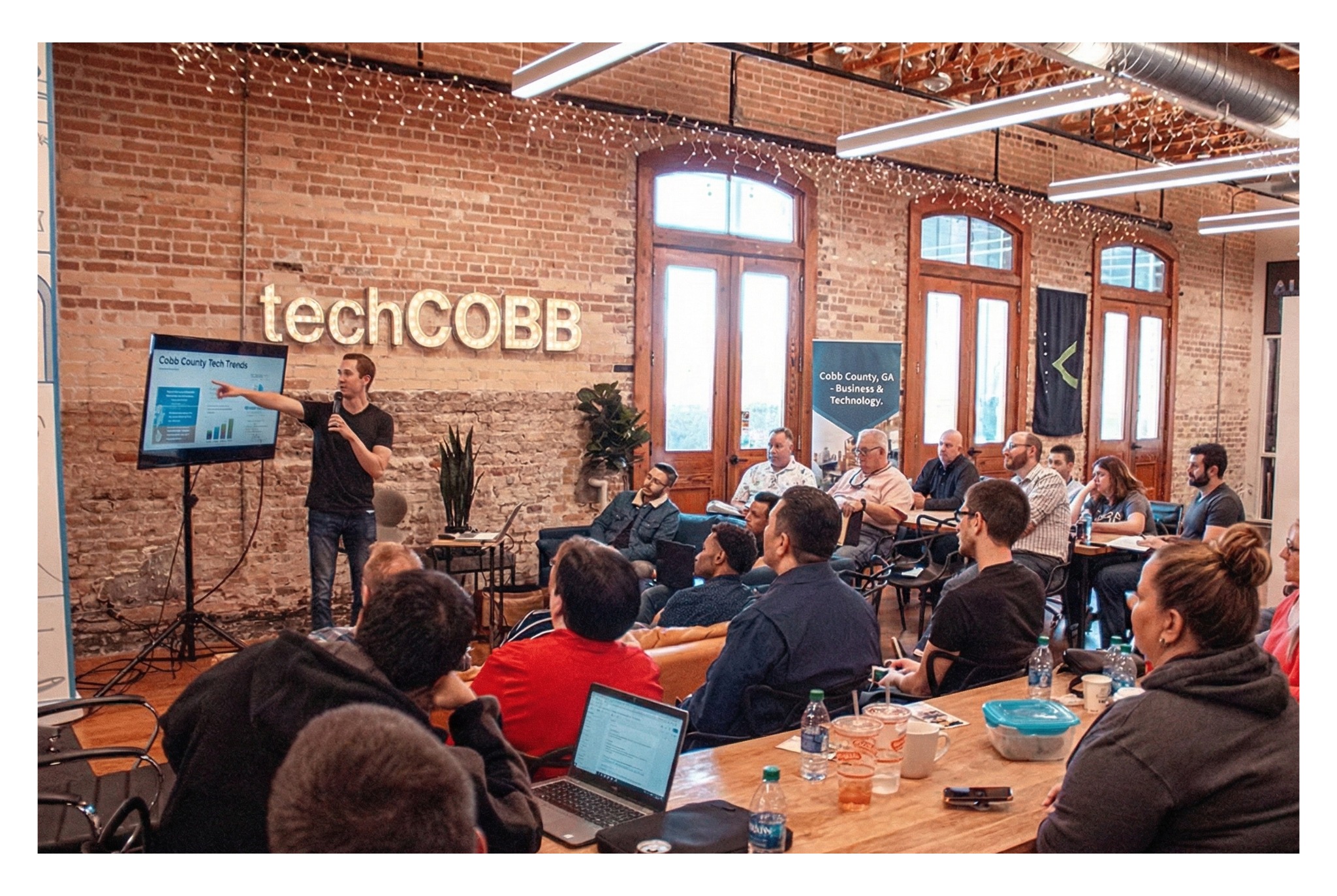 techCOBB presentation with speaker presenting to engaged audience